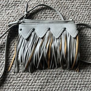Small tassel crossbody purse with multiple pockets